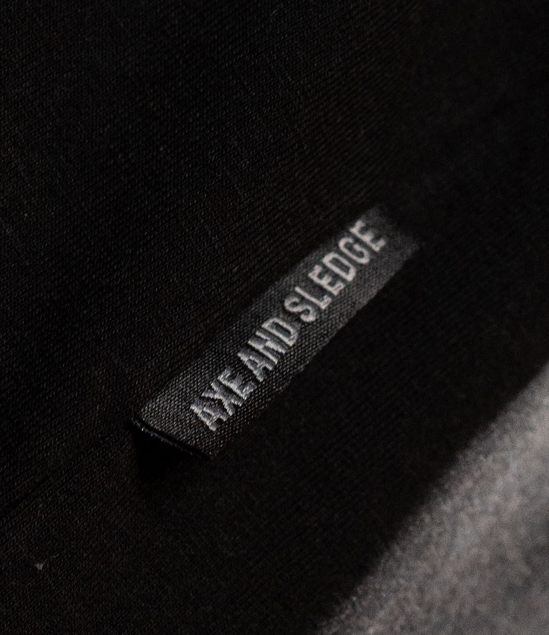 White on Black Collegiate Axe Tee